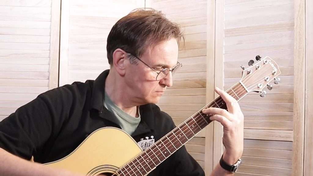 Playing a Bar Chord on Guitar