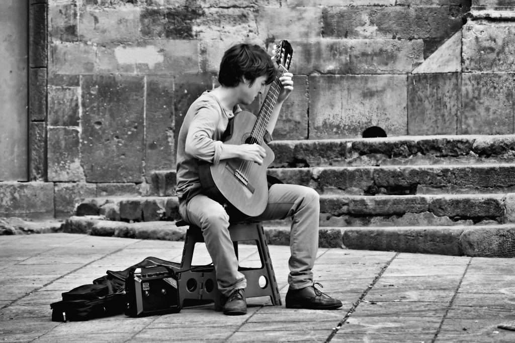 Man playing Romanza on Guitar